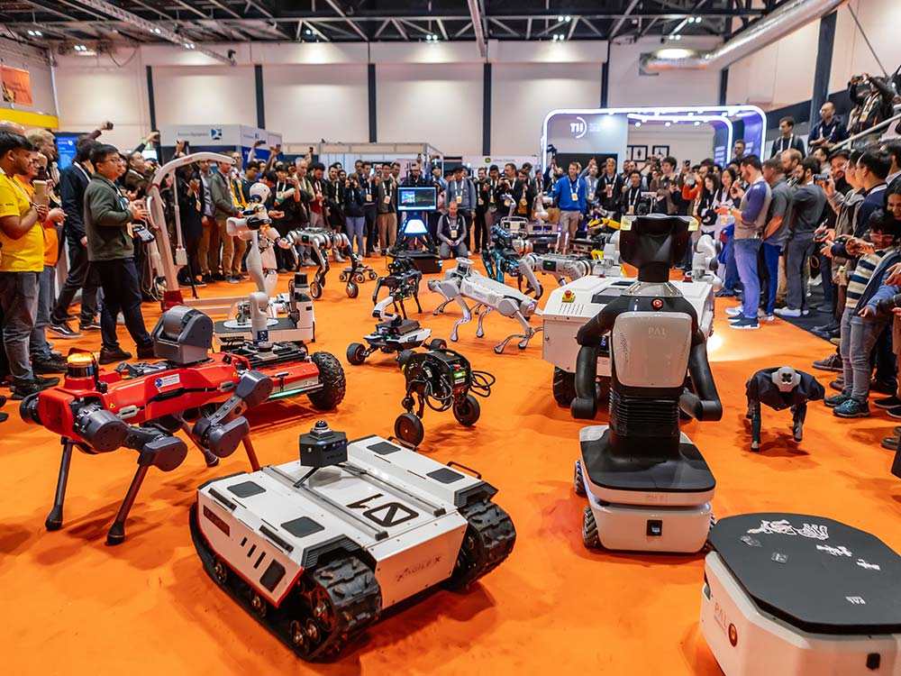 Robots And Crowd At ICRA 2023.jpg