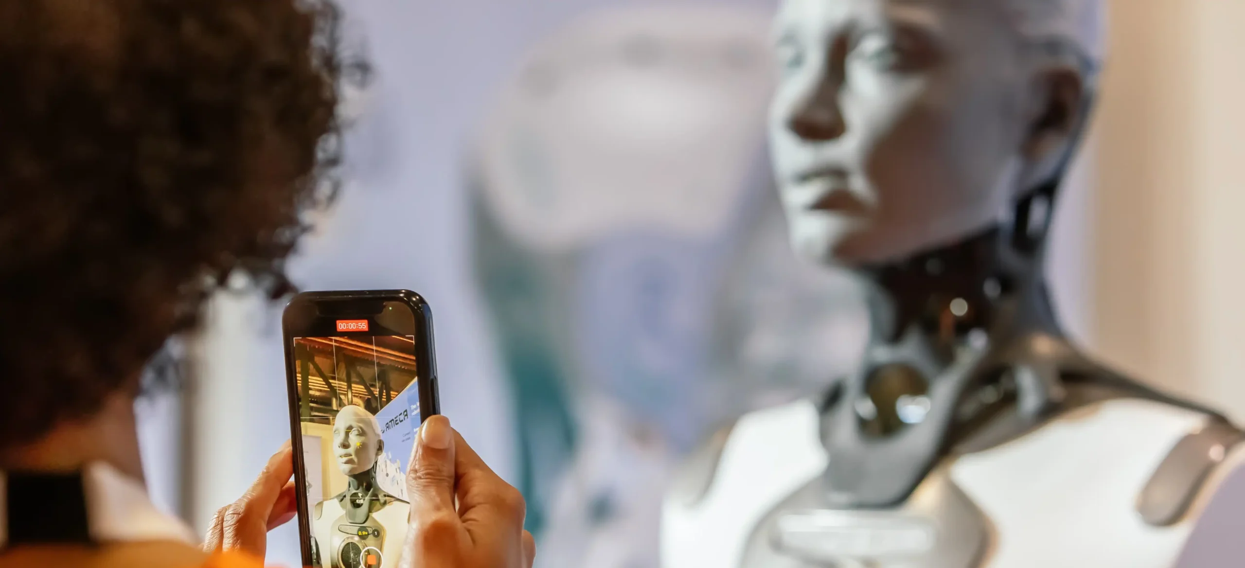 Woman Photographs Robot At ICRA Conference scaled.webp